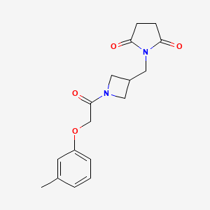 molecular formula C17H20N2O4 B2489310 1-((1-(2-(m-Tolyloxy)acetyl)azetidin-3-yl)methyl)pyrrolidine-2,5-dione CAS No. 2310140-98-6
