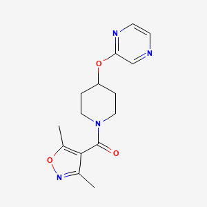 molecular formula C15H18N4O3 B2489329 (3,5-Dimethylisoxazol-4-yl)(4-(pyrazin-2-yloxy)piperidin-1-yl)methanone CAS No. 1448037-91-9