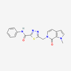 molecular formula C18H15N5O2S B2490270 5-[(1-methyl-7-oxopyrrolo[2,3-c]pyridin-6-yl)methyl]-N-phenyl-1,3,4-thiadiazole-2-carboxamide CAS No. 1444608-48-3