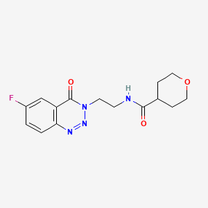 molecular formula C15H17FN4O3 B2491120 N-[2-(6-フルオロ-4-オキソ-3,4-ジヒドロ-1,2,3-ベンゾトリアジン-3-イル)エチル]オキサン-4-カルボキサミド CAS No. 1903308-20-2