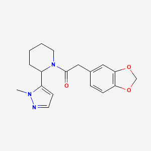 molecular formula C18H21N3O3 B2491830 2-(1,3-Benzodioxol-5-yl)-1-[2-(2-methylpyrazol-3-yl)piperidin-1-yl]ethanone CAS No. 2310141-89-8