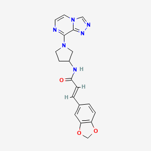 molecular formula C19H18N6O3 B2492184 (E)-N-(1-([1,2,4]triazolo[4,3-a]pyrazin-8-yl)pyrrolidin-3-yl)-3-(benzo[d][1,3]dioxol-5-yl)acrylamide CAS No. 2034998-10-0