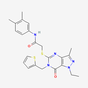 N-(3,4-dimethylphenyl)-2-({1-ethyl-3-methyl-7-oxo-6-[(thiophen-2-yl)methyl]-1H,6H,7H-pyrazolo[4,3-d]pyrimidin-5-yl}sulfanyl)acetamide