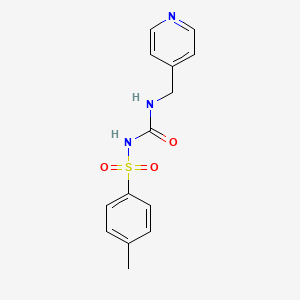 molecular formula C14H15N3O3S B2492809 4-{[({[(4-Methylphenyl)sulfonyl]amino}carbonyl)amino]methyl}pyridine CAS No. 401576-44-1