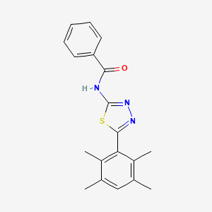 molecular formula C19H19N3OS B2494303 N-[5-(2,3,5,6-tetramethylphenyl)-1,3,4-thiadiazol-2-yl]benzamide CAS No. 391226-15-6