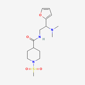 molecular formula C15H25N3O4S B2494722 N-[2-(dimethylamino)-2-(furan-2-yl)ethyl]-1-methanesulfonylpiperidine-4-carboxamide CAS No. 1197939-02-8