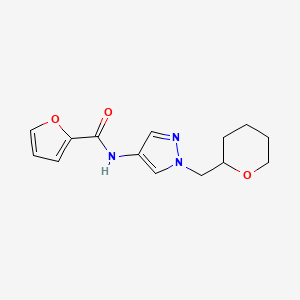 molecular formula C14H17N3O3 B2496161 N-(1-((tetrahydro-2H-pyran-2-yl)methyl)-1H-pyrazol-4-yl)furan-2-carboxamide CAS No. 2034321-58-7