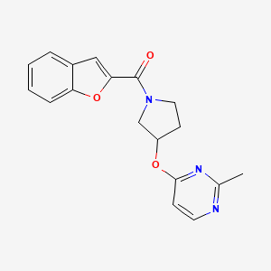 molecular formula C18H17N3O3 B2496773 4-{[1-(1-Benzofuran-2-carbonyl)pyrrolidin-3-yl]oxy}-2-methylpyrimidine CAS No. 2034318-37-9