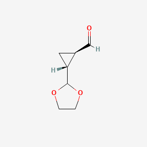 molecular formula C7H10O3 B2497374 (1R,2R)-2-(1,3-Dioxolan-2-yl)cyclopropane-1-carbaldehyde CAS No. 1932296-32-6