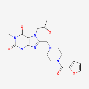 molecular formula C20H24N6O5 B2497773 8-[[4-(Furan-2-carbonyl)piperazin-1-yl]methyl]-1,3-dimethyl-7-(2-oxopropyl)purine-2,6-dione CAS No. 893945-43-2