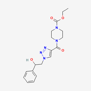 molecular formula C18H23N5O4 B2497943 ethyl 4-{[1-(2-hydroxy-2-phenylethyl)-1H-1,2,3-triazol-4-yl]carbonyl}piperazine-1-carboxylate CAS No. 1421585-82-1