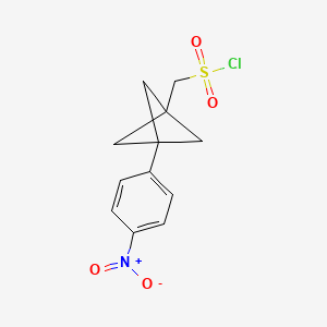 molecular formula C12H12ClNO4S B2498211 [3-(4-Nitrophenyl)-1-bicyclo[1.1.1]pentanyl]methanesulfonyl chloride CAS No. 2287283-32-1