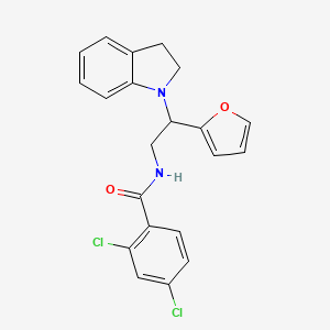 2,4-dichloro-N-(2-(furan-2-yl)-2-(indolin-1-yl)ethyl)benzamide