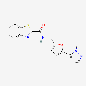 molecular formula C17H14N4O2S B2499551 N-[[5-(2-Methylpyrazol-3-yl)furan-2-yl]methyl]-1,3-benzothiazole-2-carboxamide CAS No. 2415488-53-6