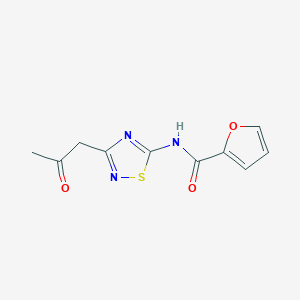 N-(3-(2-oxopropyl)-1,2,4-thiadiazol-5-yl)furan-2-carboxamide
