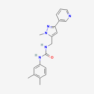 molecular formula C19H21N5O B2501663 1-(3,4-dimethylphenyl)-3-((1-methyl-3-(pyridin-3-yl)-1H-pyrazol-5-yl)methyl)urea CAS No. 2034376-60-6