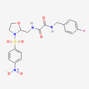 molecular formula C19H19FN4O7S B2502033 N1-(4-氟苄基)-N2-((3-((4-硝基苯基)磺酰基)恶唑烷-2-基)甲基)草酰胺 CAS No. 868981-98-0
