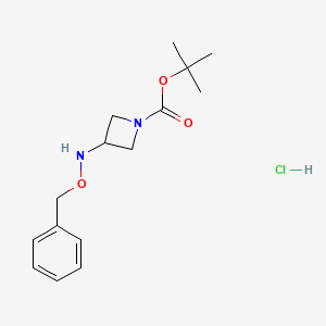 molecular formula C15H23ClN2O3 B2503083 Tert-butyl 3-(phenylmethoxyamino)azetidine-1-carboxylate;hydrochloride CAS No. 2375260-06-1