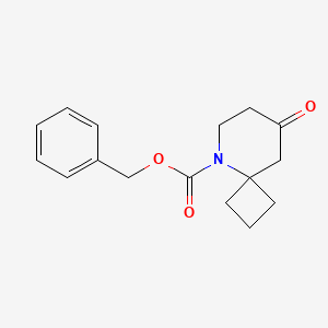 molecular formula C16H19NO3 B2503799 苯甲酸8-氧代-5-氮杂螺[3.5]壬烷-5-酯 CAS No. 1935363-59-9