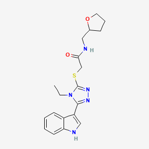 molecular formula C19H23N5O2S B2504277 2-{[4-ethyl-5-(1H-indol-3-yl)-4H-1,2,4-triazol-3-yl]thio}-N-(tetrahydro-2-furanylmethyl)acetamide CAS No. 832091-72-2