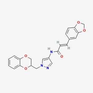 molecular formula C22H19N3O5 B2505628 (E)-3-(benzo[d][1,3]dioxol-5-yl)-N-(1-((2,3-dihydrobenzo[b][1,4]dioxin-2-yl)methyl)-1H-pyrazol-4-yl)acrylamide CAS No. 1798414-06-8