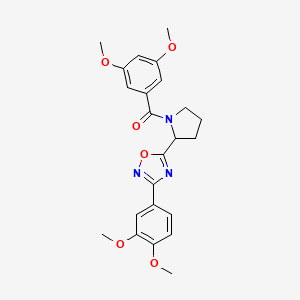 molecular formula C23H25N3O6 B2505940 5-[1-(3,5-Dimethoxybenzoyl)pyrrolidin-2-yl]-3-(3,4-dimethoxyphenyl)-1,2,4-oxadiazole CAS No. 1790341-07-9