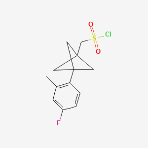 molecular formula C13H14ClFO2S B2506202 [3-(4-Fluoro-2-methylphenyl)-1-bicyclo[1.1.1]pentanyl]methanesulfonyl chloride CAS No. 2287313-82-8
