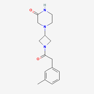 4-(1-(2-(m-Tolyl)acetyl)azetidin-3-yl)piperazin-2-one