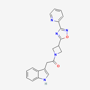 B2506753 2-(1H-indol-3-yl)-1-(3-(3-(pyridin-2-yl)-1,2,4-oxadiazol-5-yl)azetidin-1-yl)ethanone CAS No. 1251579-40-4