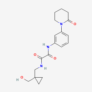 molecular formula C18H23N3O4 B2508271 N1-((1-(hydroxymethyl)cyclopropyl)methyl)-N2-(3-(2-oxopiperidin-1-yl)phenyl)oxalamide CAS No. 1251552-98-3