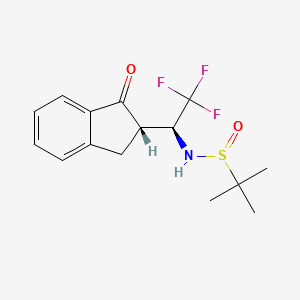 molecular formula C15H18F3NO2S B2508810 (S)-2-Methyl-N-[(1S)-2,2,2-trifluoro-1-[(2S)-1-oxo 2,3-dihydro-1H-inden-2-yl]ethyl]propane-2-sulfinamide CAS No. 1556948-38-9