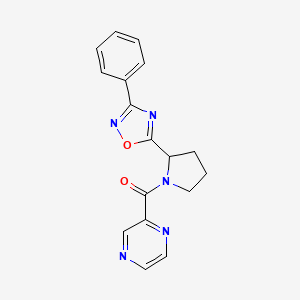 molecular formula C17H15N5O2 B2509439 2-{[2-(3-Phenyl-1,2,4-oxadiazol-5-yl)pyrrolidin-1-yl]carbonyl}pyrazine CAS No. 1788628-99-8