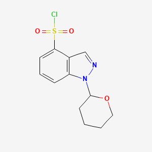 molecular formula C12H13ClN2O3S B2509706 1-(Oxan-2-yl)indazole-4-sulfonyl chloride CAS No. 2413885-08-0