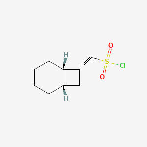 molecular formula C9H15ClO2S B2510497 [(1S,6S,7R)-7-Bicyclo[4.2.0]octanyl]methanesulfonyl chloride CAS No. 2138010-79-2
