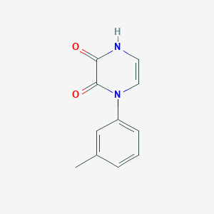 4-(3-methylphenyl)-1H-pyrazine-2,3-dione