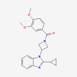molecular formula C22H23N3O3 B2510950 [3-(2-Cyclopropylbenzimidazol-1-yl)azetidin-1-yl]-(3,4-dimethoxyphenyl)methanone CAS No. 2380057-10-1