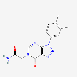 molecular formula C14H14N6O2 B2512070 2-[3-(3,4-二甲苯基)-7-氧代三唑并[4,5-d]嘧啶-6-基]乙酰胺 CAS No. 893946-62-8