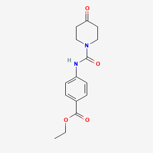 molecular formula C15H18N2O4 B2513103 Ethyl 4-{[(4-oxopiperidin-1-yl)carbonyl]amino}benzoate CAS No. 1352496-63-9