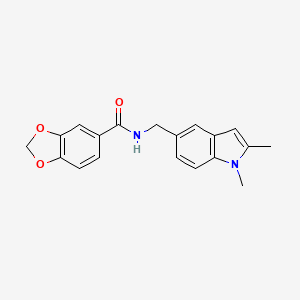 molecular formula C19H18N2O3 B2513701 N-[(1,2-二甲基吲哚-5-基)甲基]-1,3-苯并二氧杂环-5-甲酰胺 CAS No. 852137-29-2