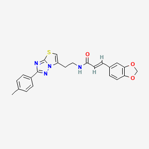 molecular formula C23H20N4O3S B2514056 (E)-3-(苯并[d][1,3]二氧杂环-5-基)-N-(2-(2-(对甲苯基)噻唑并[3,2-b][1,2,4]三唑-6-基)乙基)丙烯酰胺 CAS No. 894028-60-5