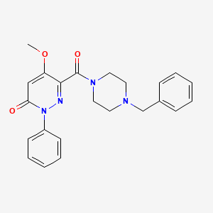 molecular formula C23H24N4O3 B2515230 6-(4-Benzylpiperazine-1-carbonyl)-5-methoxy-2-phenylpyridazin-3-one CAS No. 941948-26-1