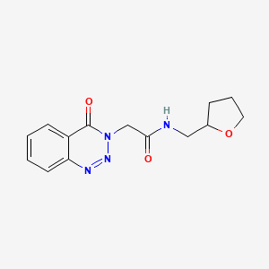 molecular formula C14H16N4O3 B2515852 2-(4-oxo-3,4-dihydro-1,2,3-benzotriazin-3-yl)-N-[(oxolan-2-yl)methyl]acetamide CAS No. 440332-07-0