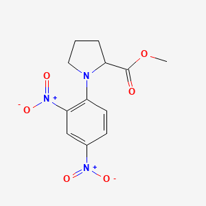 molecular formula C12H13N3O6 B2516063 Methyl 1-(2,4-dinitrophenyl)pyrrolidine-2-carboxylate CAS No. 10420-70-9