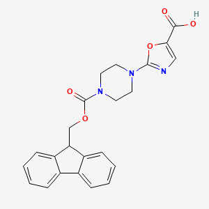 molecular formula C23H21N3O5 B2516123 2-[4-(9H-Fluoren-9-ylmethoxycarbonyl)piperazin-1-yl]-1,3-oxazole-5-carboxylic acid CAS No. 2253640-22-9