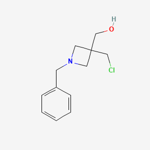 [1-Benzyl-3-(chloromethyl)azetidin-3-yl]methanol