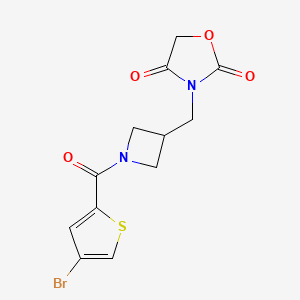 3-((1-(4-Bromothiophene-2-carbonyl)azetidin-3-yl)methyl)oxazolidine-2,4-dione