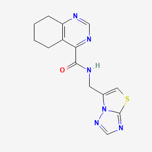 molecular formula C14H14N6OS B2516658 N-([1,3]Thiazolo[3,2-b][1,2,4]triazol-6-ylmethyl)-5,6,7,8-tetrahydroquinazoline-4-carboxamide CAS No. 2415552-55-3