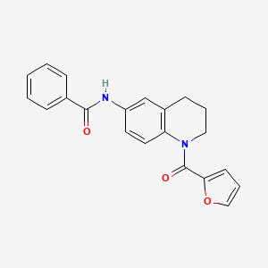 molecular formula C21H18N2O3 B2516772 N-[1-(furan-2-carbonyl)-3,4-dihydro-2H-quinolin-6-yl]benzamide CAS No. 942005-70-1