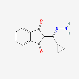 molecular formula C13H12N2O2 B2516807 2-(环丙基羰基)茚满-1,3-二酮腙 CAS No. 1025124-19-9