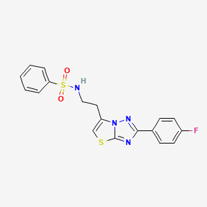 molecular formula C18H15FN4O2S2 B2518050 N-(2-(2-(4-fluorophenyl)thiazolo[3,2-b][1,2,4]triazol-6-yl)ethyl)benzenesulfonamide CAS No. 895442-71-4